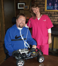 Jeff Stafsholt, an avid RC hobbiest, with his home care provider, Tammy Yuhala.