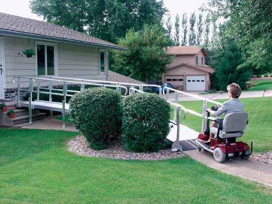 A modular ramp extending out of a house by several feet