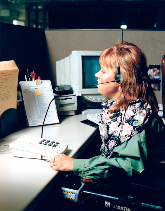 Woman at work using a headset