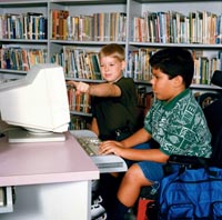 Boys working on a computer
