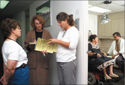 A woman with ALS visits a clinic