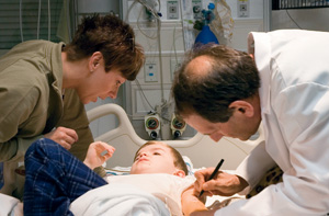 Andrew Kilbarger, 8, receiving an injection of dystrophin genes in March 2006.
