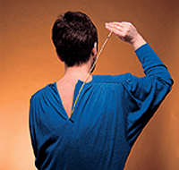 Woman using a zipper pull
