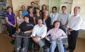 Steve Wilton (DMD/BMD):  Wilton (center) poses with members of his research team.