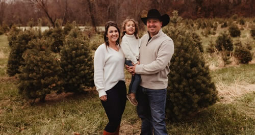 A family posing for a picture.