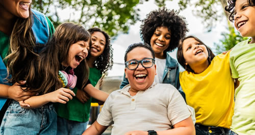 Image of people smiling and laughing.