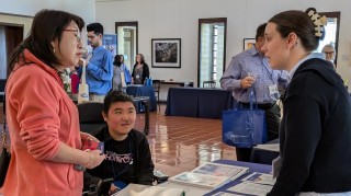 A photo of the ticket booth at an MDA Engage event.