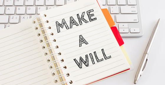 A picture of a notebook that says 'make a will'.